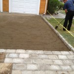 Bren did the belgian block, Canfield the prep and paving.