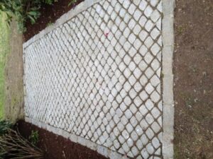 Cobblestone path with belgian block border gets you through the mud